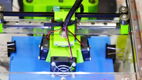 Top view of 3D printer working with plastic resin Stock Footage 147863044