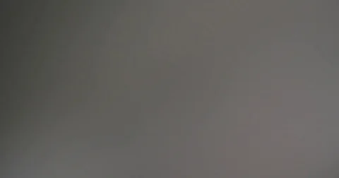 Top View 4k Man Young Handsome Wiping Camera Screen Laugh Happy Smiling Footage. Stock Footage 82690658