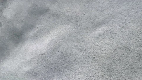 Top view 4K resolution video banner with sand, sea foam and waves. Scene of top Stock Footage 238481947