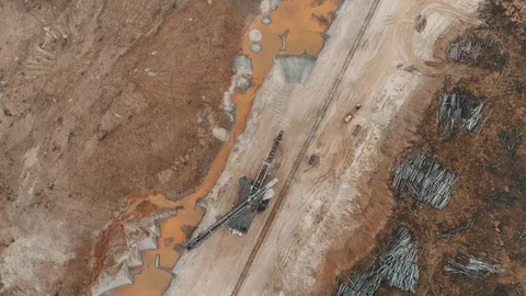 Top view of abandoned giant excavator. An abandoned giant excavator and a non Video stock 83736764