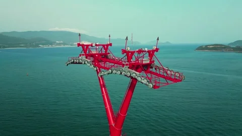 Top view above around huge structure of the power tower of the cable car in the Stock Footage 264687613