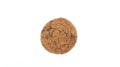 Top view from above of one soft and chewy chocolate chip oatmeal cookies Stock Footage 94898093