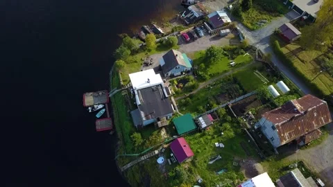 Top view aerial drone video of village and seacost on summer day in Karelia Stock Footage 220453036