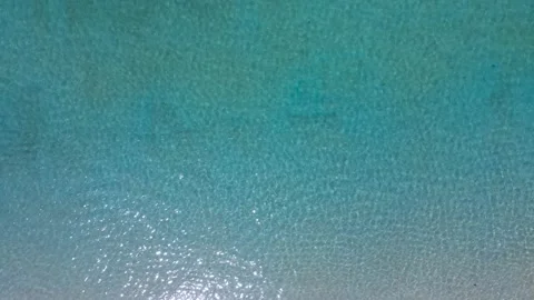 Top view Aerial view of drone Turquoise beach sea sand copy space. 4K Nature vid Stock Footage 153385147