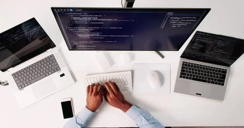 Top View Of African American Programmer Man Coding On Computer 스톡 사진