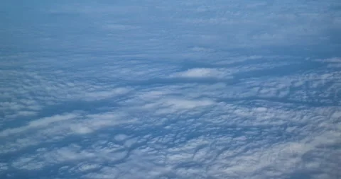 Top view via airplane of white clouds, concept holidays Video stock 272579577