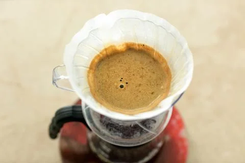 Top view of alternative method of brewing v60 coffee in a glass drip decanter. Stock Photos