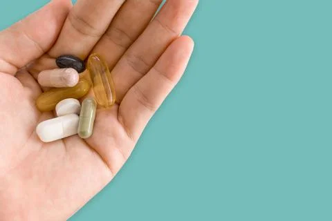 Top view of alternative organic medicine or herbal viatmin supplement capsule Stock Photos