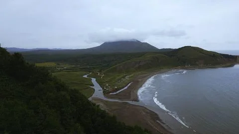 Top view of amazing landscape of mountain coast on cloudy day. Clip. Cinematic Stock Photos