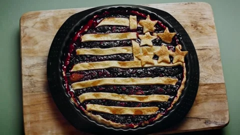 Top view of an American flag berry tart on a wooden board, 4K Stock Footage 341118844