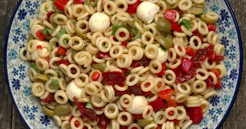 Top view of anelli siciliani pasta salad. Stock Footage 299930833