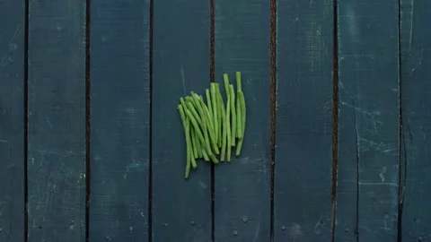 Top View of Animated Vegetables Appearing on Wooden Background Stock Footage 143242607