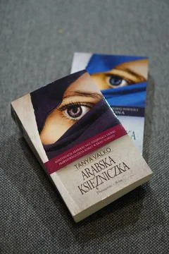 Top view of Arabska Ksieznicka novel meaning Arabian Princess in English on gray Stock Photos