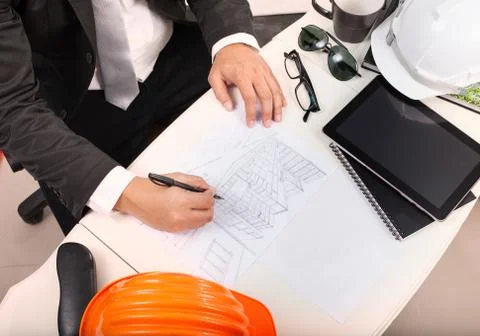 Top view of architect working table with drawing perspective building plan an Foto stock