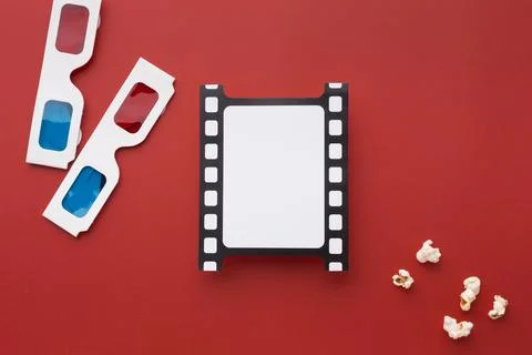 Top view arrangement movie elements red background Stock Photos
