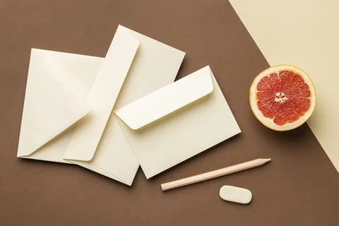 Top view arrangement with stationery elements grapefruit Stock Photos