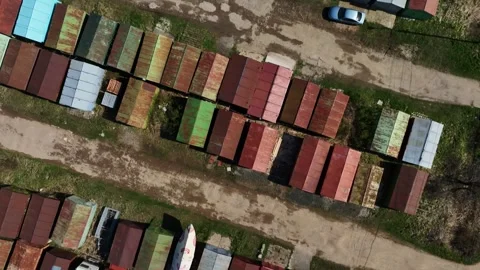 Top view of an array of metal garages where people keep a wide variety of 動画素材 240825316
