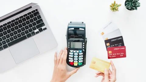 Top view of Asia lady using laptop online shopping with credit card pay the.. Stock Photos