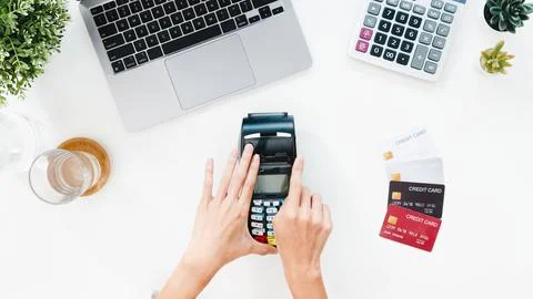 Top view of Asia lady using laptop online shopping with credit card pay the.. Stock Photos