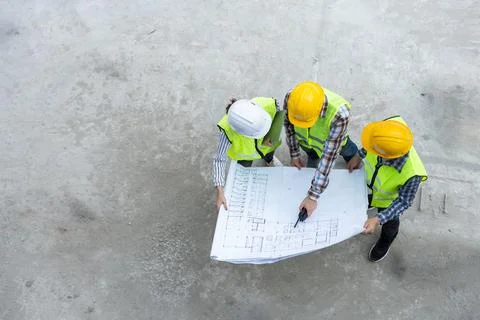 Top view of Asian engineer or Young Female Architect put on a helmet for safe Stock Photos