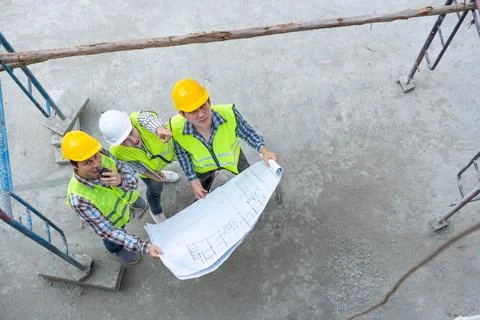 Top view of Asian engineer or Young Female Architect put on a helmet for sa.. Foto stock