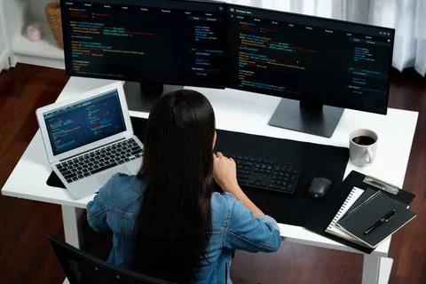 Top view Asian IT creating with typing online information on pc. Stratagem. Stock-Fotos