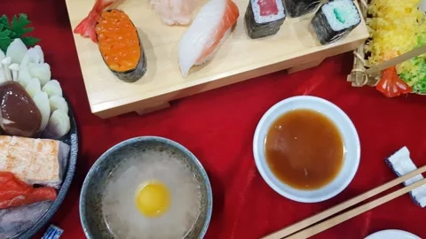 Top view of assorted fresh Japanese sushi and sukiyaki dinner set Stock-Footage 336230211