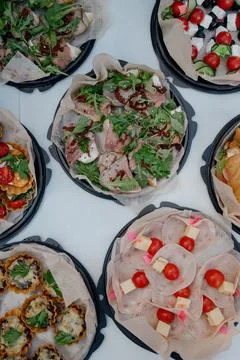 Top view of assorted meat and vegetable buffet appetizers Stock Photos