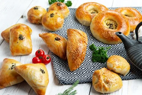 Top view of assorted oriental baked meat pies. samsa. Stock Photos
