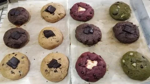 Top View of Assorted Soft Baked Cookies on Baking Paper Stock Photos