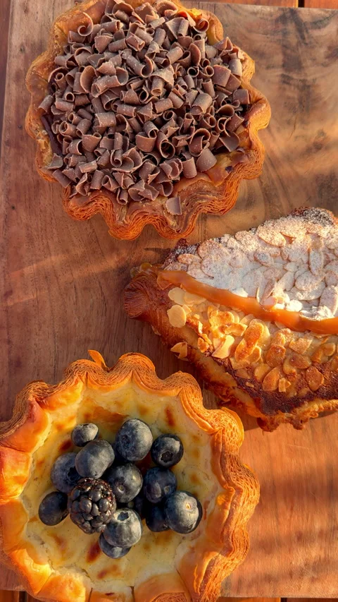 Top view of assorted viennoiserie pastries Stock Footage 340175711