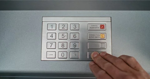 Top View on ATM User Pressing Buttons on ATM Keypad, Entering PIN Code for Cash Stock Footage 309289225