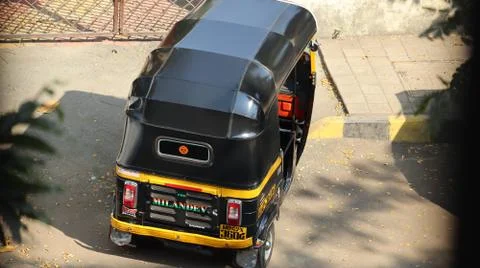 Top view of an auto rickshaw standing on the street of India. Stock Photos