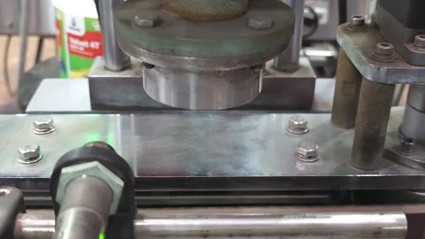 Top view of automatic container bottle capping machine. Stock Footage 302177580