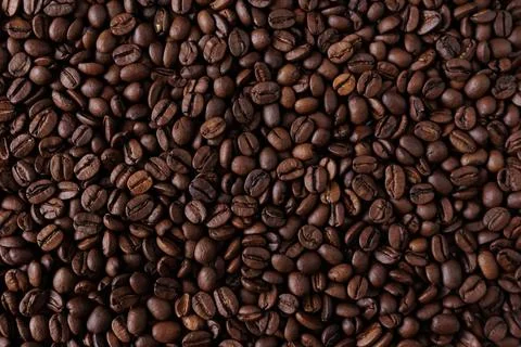 Top view background of aromatic brown coffee beans Foto stock
