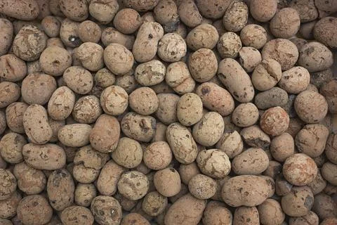 Top view on background from expanded clay. Construction material Stock Photos