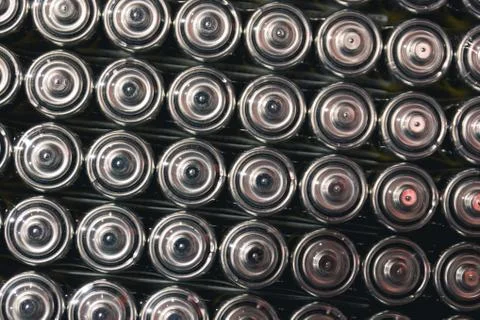 Top view background texture of electric batteries and accumulators AAA AA packed Stock Photos