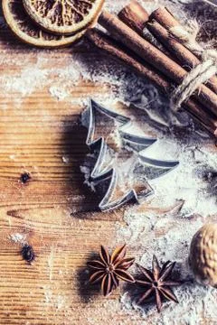 Top of view bakery table full of christmas aromatic ingredients star anise ci Stock Photos