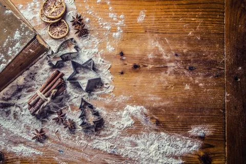 Top of view bakery table full of christmas aromatic ingredients star anise ci Stock Photos