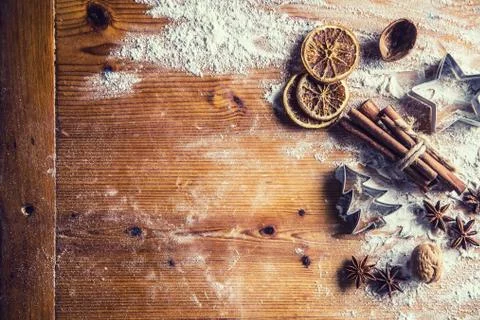 Top of view bakery table full of christmas aromatic ingredients star anise ci Stock Photos