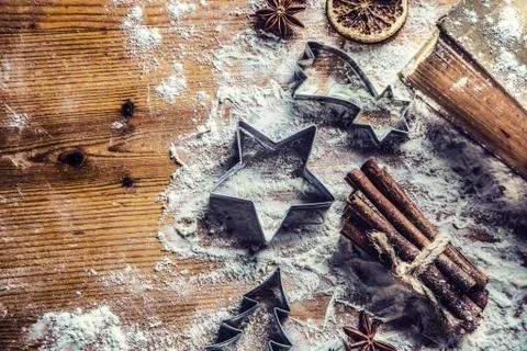Top of view bakery table full of christmas aromatic ingredients star anise ci Stock Photos