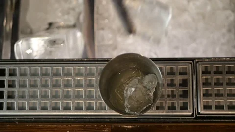 Top view, barman puts ice in a glass Stock Footage 75705954