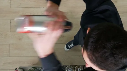 Top view of bartender mixing cocktail in shaker Stock Footage 72736543