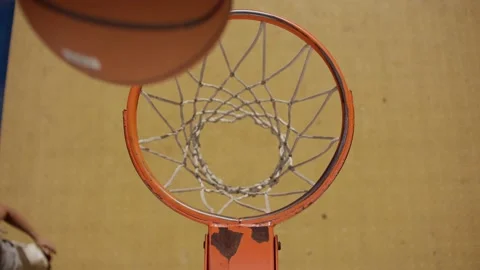 Top view of a basketball basket with a shadow silhouette of a player. Throw the Stock Footage 240053285