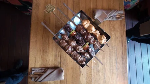 Top view BBQ. Top view of traditional serving dishes. Meat, vegetables. Plate Video stock 121580640