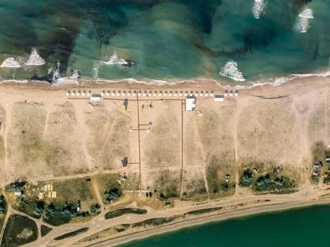 Top view of the beach between the sea and the estuary. Crimea Stock Photos