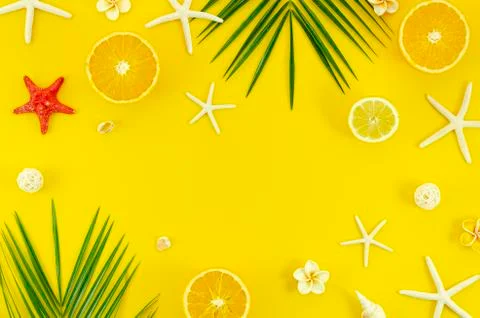 Top view beach flat lay with space for promo text travel agency on yellow Stock Photos
