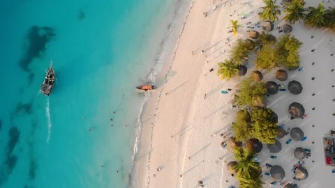 Top View on Beach Line with Resorts at Zanzibar Nungwi beach at evening time Stock Footage 127313722