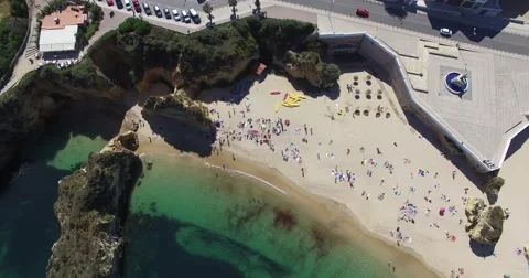 Top view on beach near cliffs Lagos aerial view Stock Footage 64459506