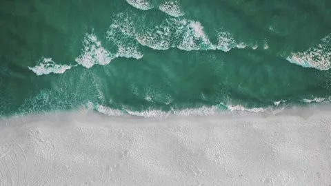 Top View of Beach Waves Crashing by drone Stock Footage 269885852